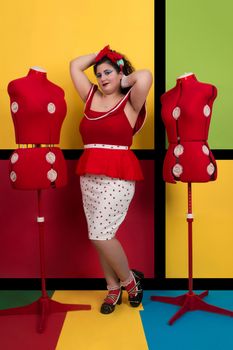 View of pinup vintage girl next to a colorful pop art backdrop.