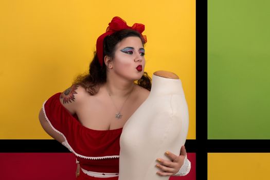 View of pinup vintage girl next to a colorful pop art backdrop.