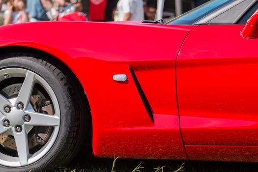 Close up view of a sports car wheel.