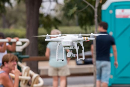 View of a small consumer quadrocopter drone in flight.