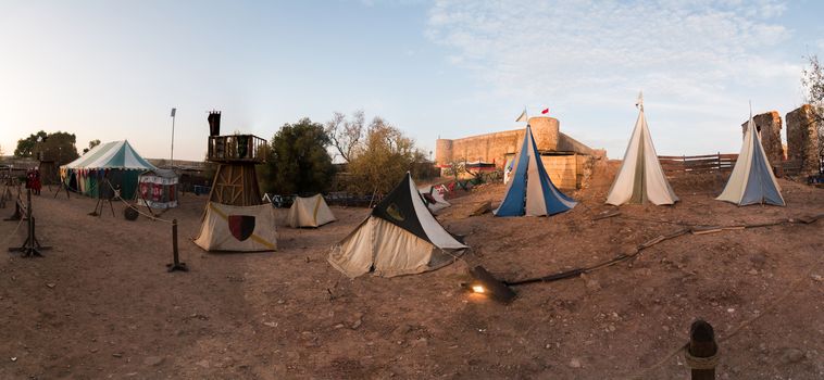 View of a typical medieval camp site with tents.