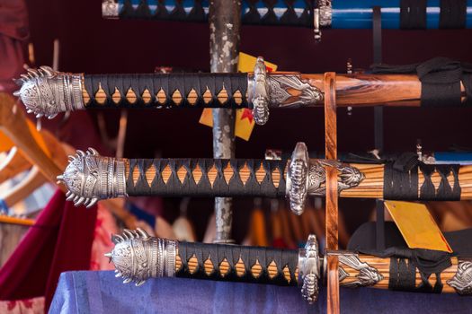 Detailed replica swords in Medieval fair.