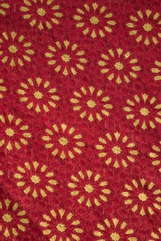 Close up view of Traditional red  and golden medieval fabric design.