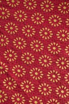 Close up view of Traditional red  and golden medieval fabric design.