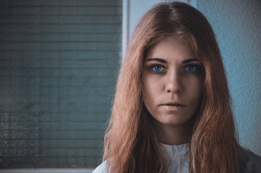 Disturbing Image of a mentally ill girl portrait photo