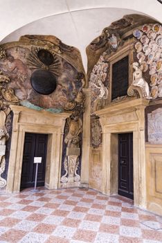 Decorations on the wall and the portico in Archiginnasio library of Bologna. It is one of the most important building on June 25, 2017 in Bologna, Italy.