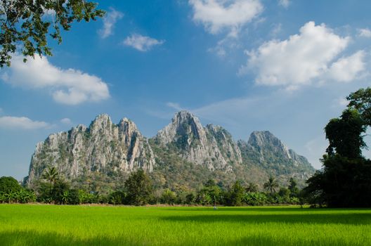 Kao Nor Kao Kawg is limestone mountain in Nakon sawan Province and have green paddy ,blue sky