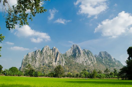 Kao Nor Kao Kawg is limestone mountain in Nakon sawan Province and have green paddy ,blue sky