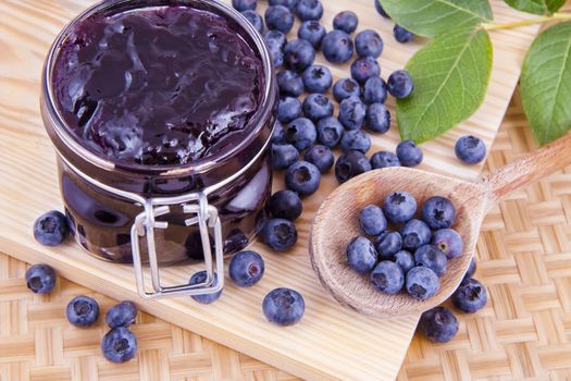 Blueberry fruits jam in the kitchen on the table