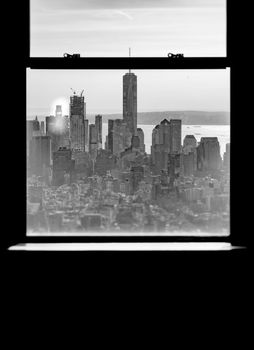 New York black and white skyline viewed through a window frame