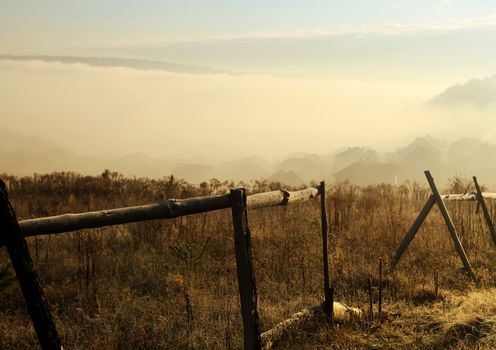 sky with fog over countryside at autumn