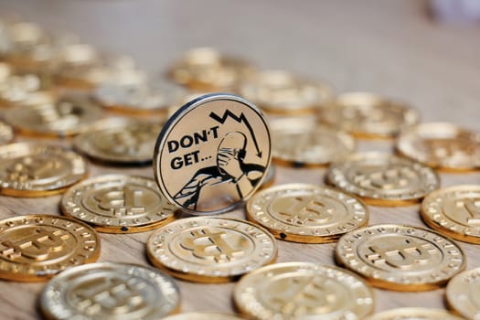 Digital currency physical metal bitcoin coin on the gold money background. Money concept.