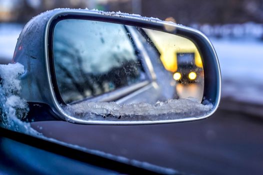 View in the side mirror of the car.