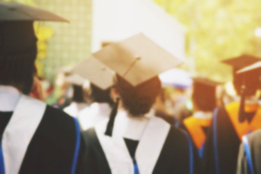 blurred image,shot of graduation hats during commencement success graduates of the university, Concept education congratulation. Graduation Ceremony ,Congratulated the graduates in University.