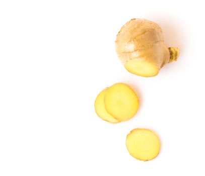 Fresh ginger with slices on white background for herb and medical product concept, selective focus