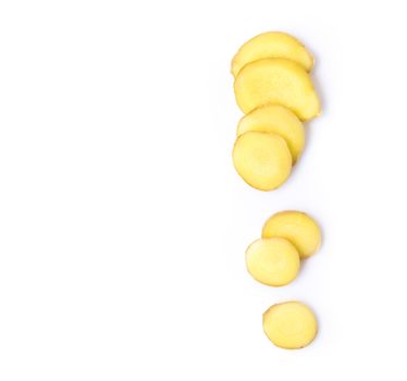 Fresh ginger with slices on white background for herb and medical product concept, top view