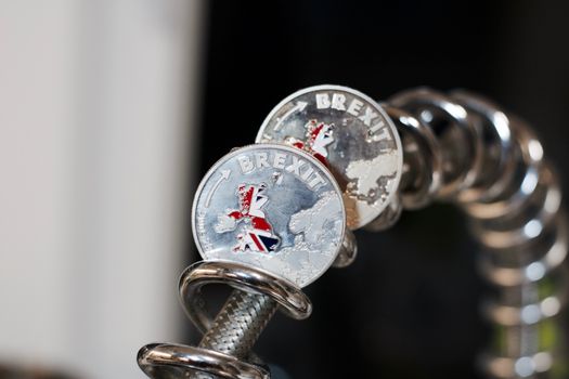 Physical metal brexit coin with map of england. Brexit concept. Europe leaving.