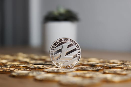 Digital currency physical metal litecoin coin. Cryptocurrency miningn concept.