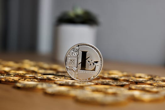Digital currency physical metal litecoin coin. Cryptocurrency miningn concept.