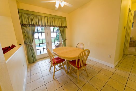 An interior photo of a breakfast area in a home