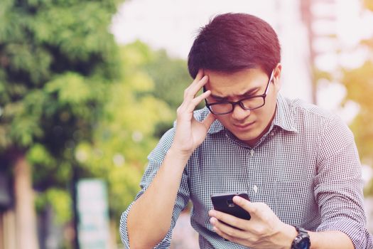 Businessman use smartphones to contact customers