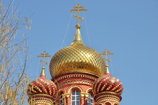 New church with gilded domes in the city of Astrakhan