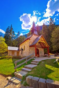 Church and Braies lake in Dolomite Apls, South Tyrol, Italy