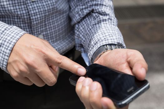 Businessman use smartphones to contact customers