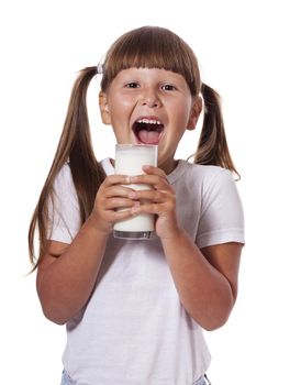 Six years Girl holding glass of milk isolated on white