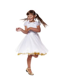 Cheerful girl dancing on floor isolated on white