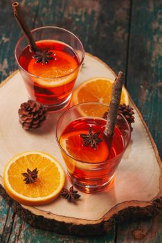 Christmas mulled wine on a rustic wooden table. Holidays concept.