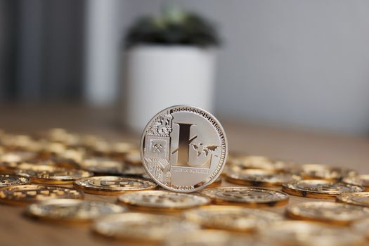 Digital currency physical metal litecoin coin. Cryptocurrency miningn concept.
