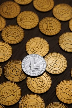 Digital currency physical metal litecoin coin. Cryptocurrency miningn concept.