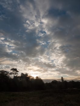 stunning dramatic morning cloudy blue sky overhead space; essex; england; uk