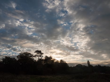 stunning dramatic morning cloudy blue sky overhead space; essex; england; uk