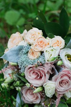 Beautiful wedding bouquet and rings.