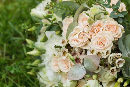 Beautiful wedding bouquet and Beautiful wedding rings.