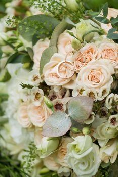 Beautiful wedding bouquet and Beautiful wedding rings.