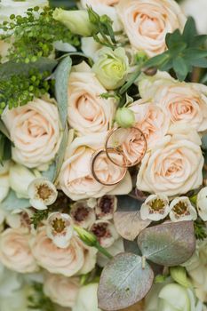 Beautiful wedding bouquet and Beautiful wedding rings.