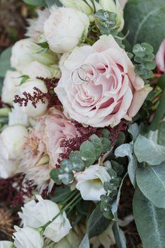 Beautiful wedding bouquet and Beautiful wedding rings.