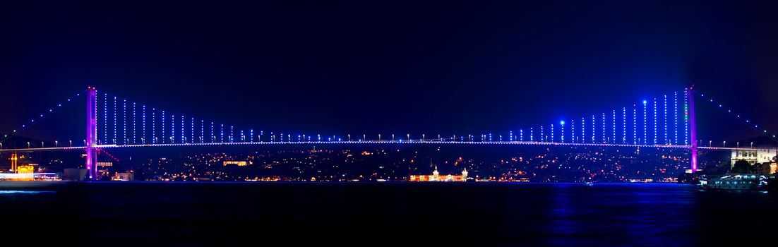 Illuminated Bosphorus bridge in Istanbul at night, Turkey