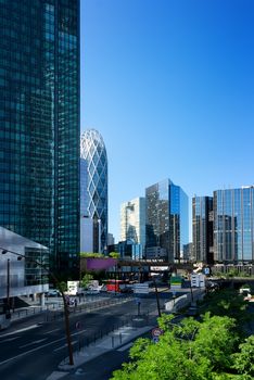 Modern skyscrapers and road in parisian district la Defence, France