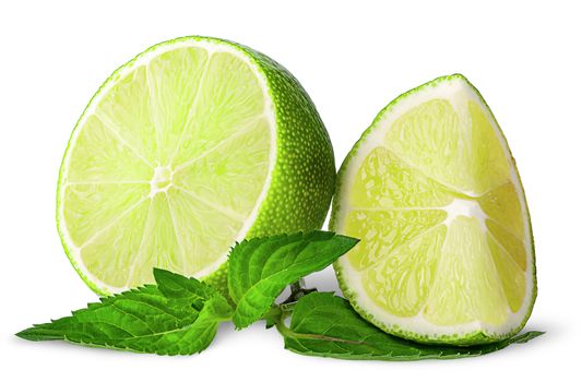 Several pieces of lime with mint isolated on white background