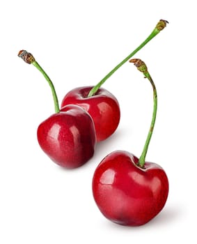 Several sweet cherries in row isolated on white background