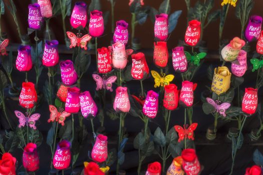 Wooden flowers with a written message