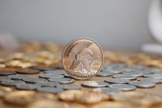 Digital currency physical metal bitcoin coin. Cryptocurrency mining concept.