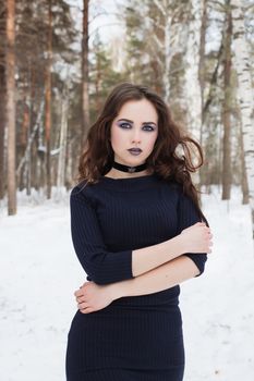 portrait of beautiful young woman smiling in winter time