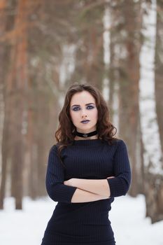 portrait of beautiful young woman smiling in winter time