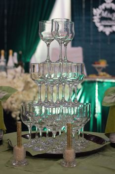 waiters poured into glasses of wine and champagne.