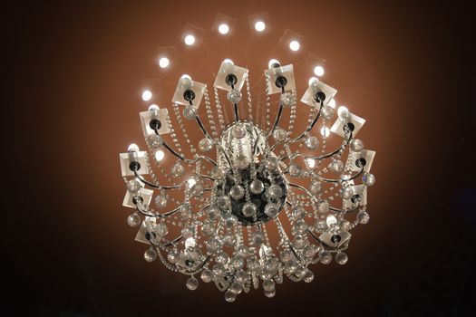 Close up on crystal of contemporary chandelier.